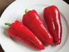 Sweet red "Italian fryer" type. Medium size peppers